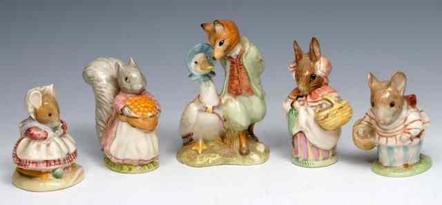 Appraisal: A ROYAL DOULTON FIGURE of Mrs Rabbit together with Beswick