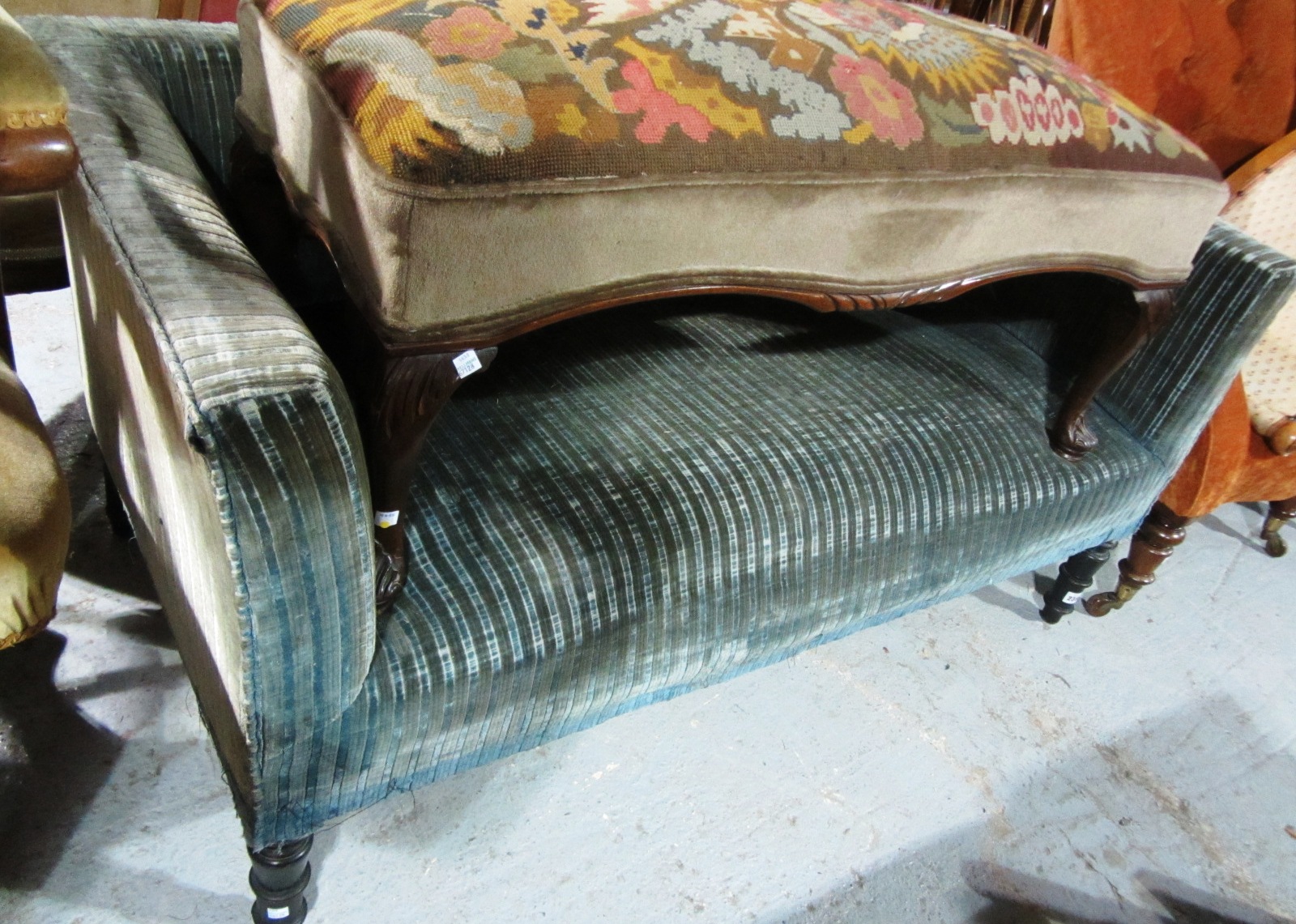 Appraisal: A th century two seat sofa with turned ebonised supports