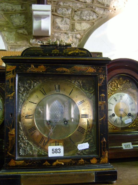 Appraisal: An Edwardian bracket clock in a Georgian style with black