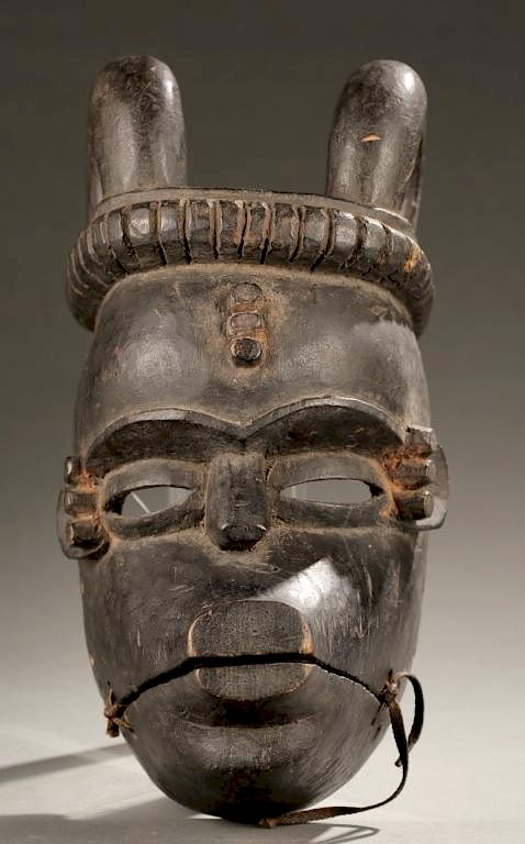 Appraisal: Ibibio horned mask with articulating jaw A wooden horned mask