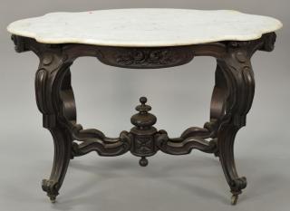 Appraisal: Victorian rosewood marble top center table having turtle shaped top