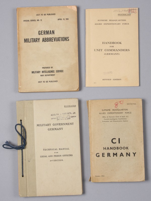 Appraisal: Grouping of manuals including SHAEF handbook for unit commanders Germany