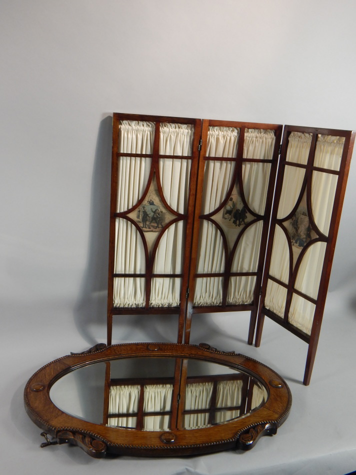 Appraisal: An Edwardian small three fold fire screen the centre sections