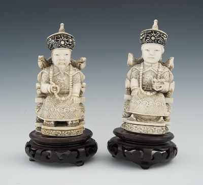 Appraisal: Carved Ivory Figurines of an Emperor and an Empress Two