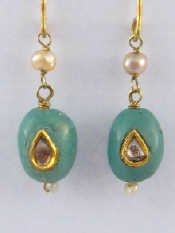 Appraisal: A pair of diamond set matrix turquoise and freshwater pearl