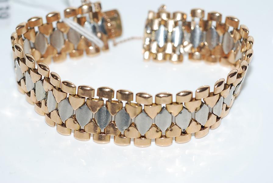 Appraisal: A TWO TONE COCKTAIL BRACELET IN CT GOLD A TWO