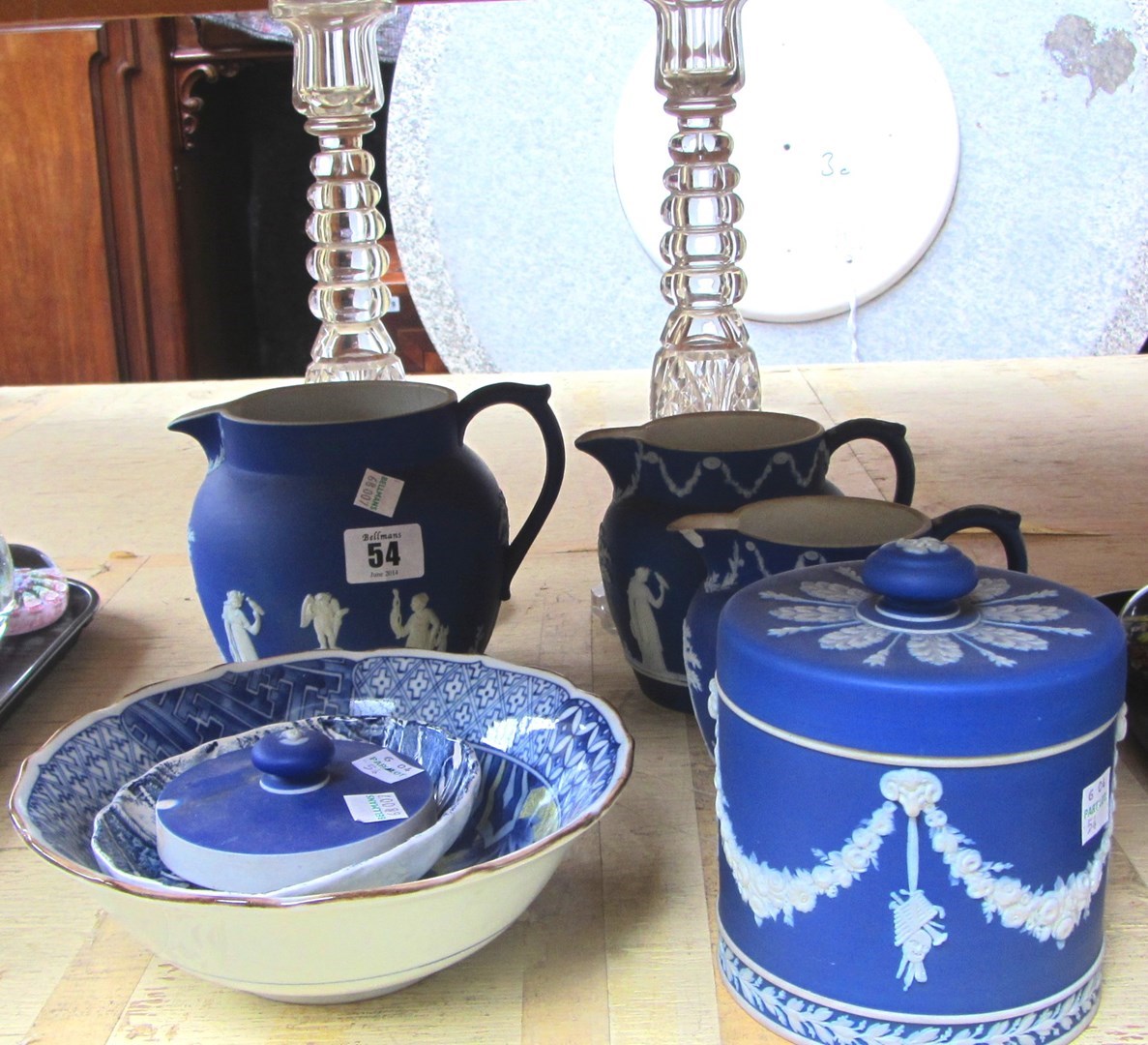 Appraisal: A set of three Wedgwood blue jasper jugs circa sprigged