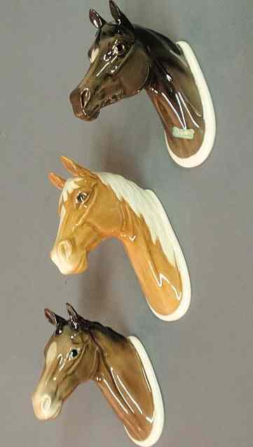 Appraisal: Three Beswick porcelain horsehead wall plaques- Arab Palomino hunter h