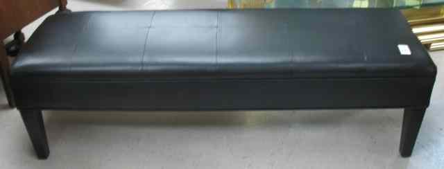 Appraisal: A CONTEMPORARY BLACK LEATHER BENCH featuring long rectangular black leather