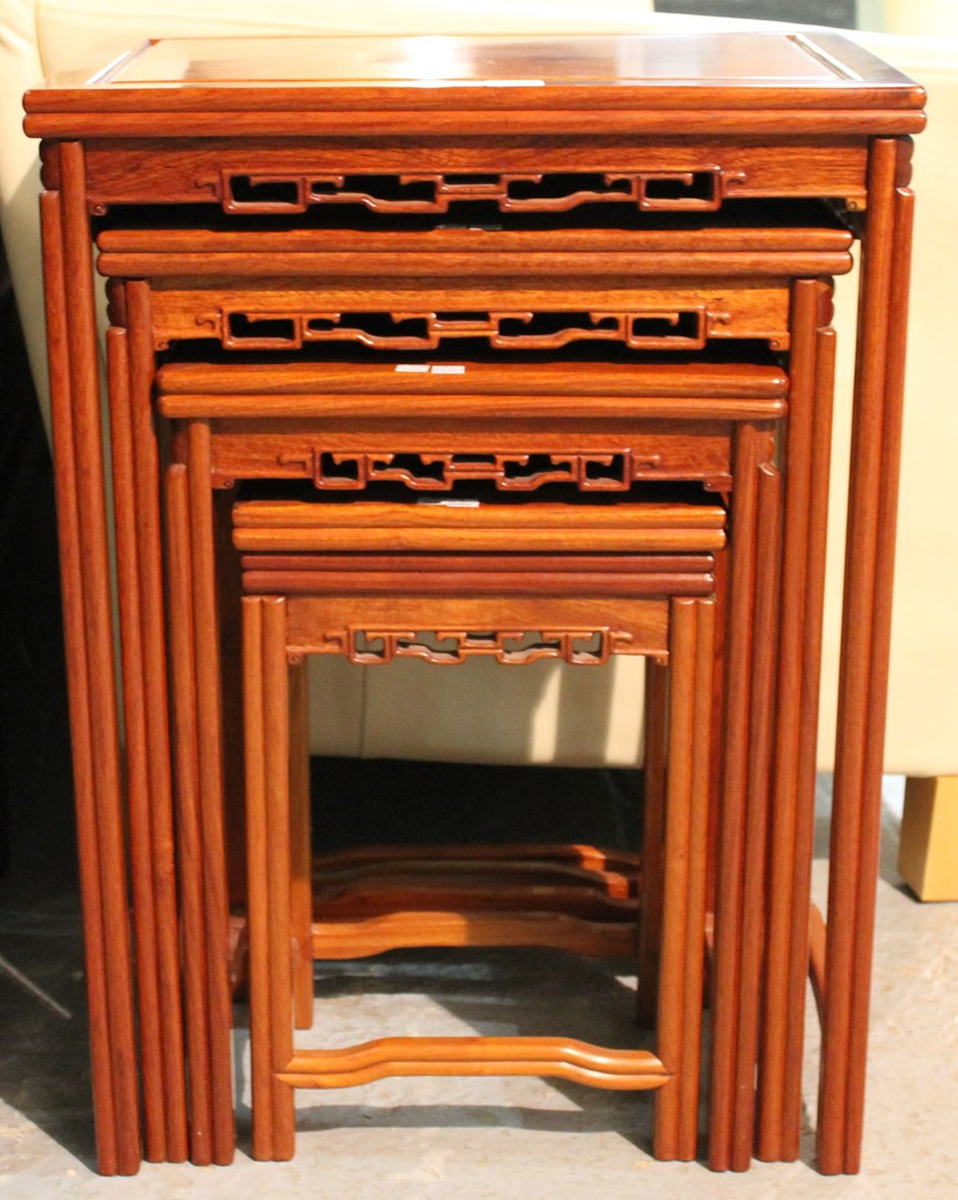 Appraisal: A th century Chinese hardwood nest of four tables with