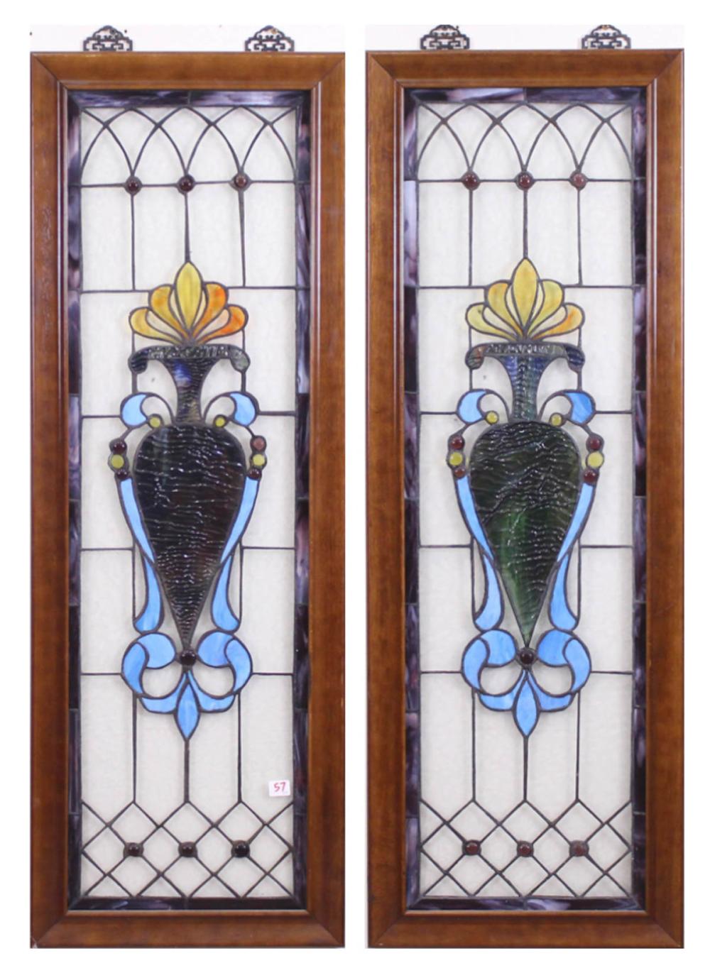 Appraisal: PAIR OF STAINED AND LEADED GLASS WINDOWS IN WOOD FRAMES