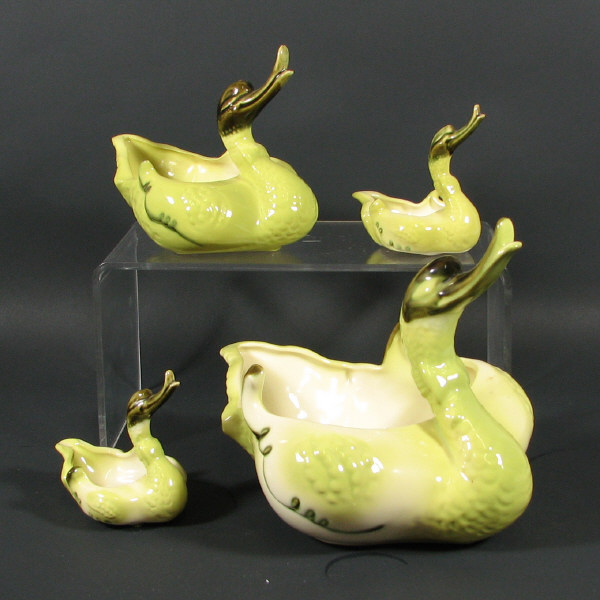 Appraisal: Hull Novelty - Swans Lot of four Novelty swans in