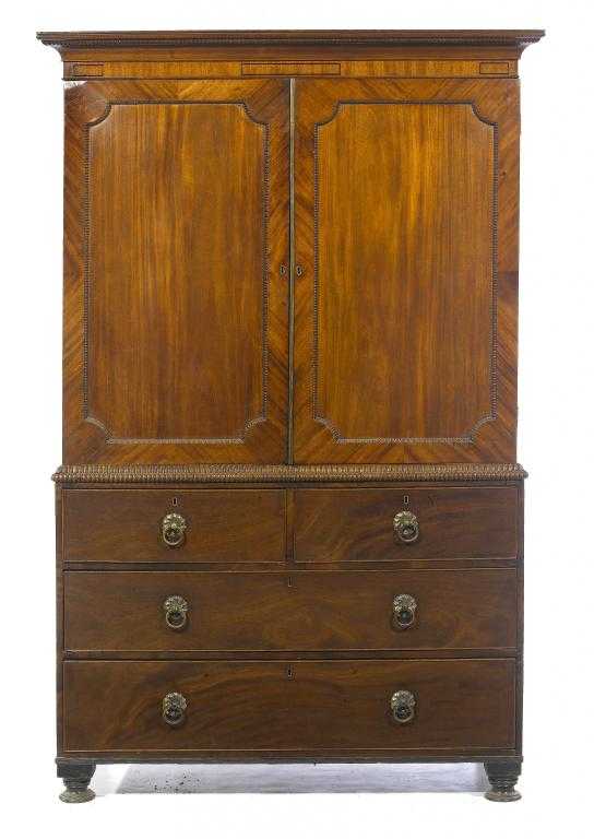 Appraisal: A WILLIAM IV MAHOGANY LINEN PRESS with beaded cavetto cornice