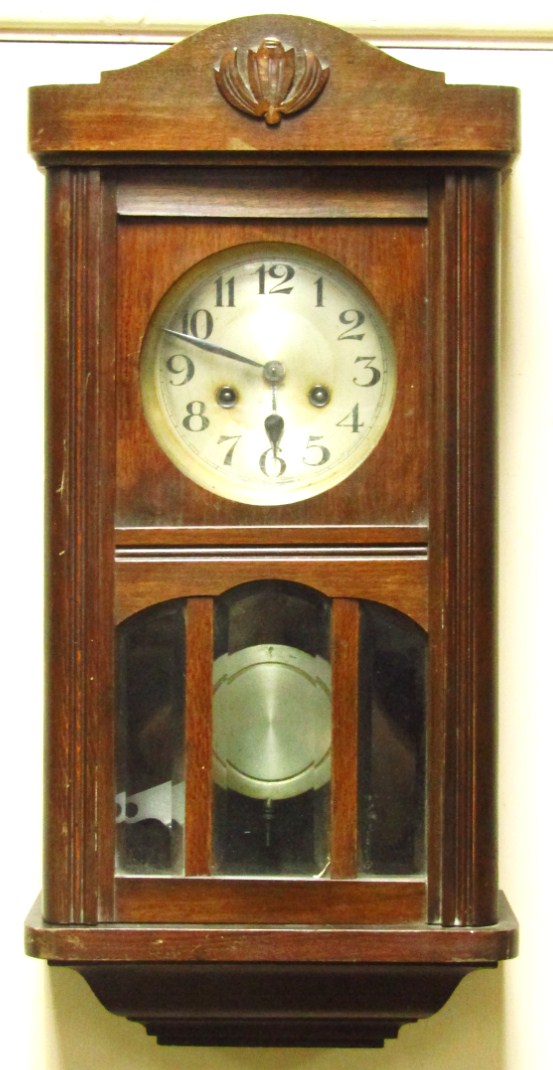 Appraisal: An early thC oak stained wall clock with a cm