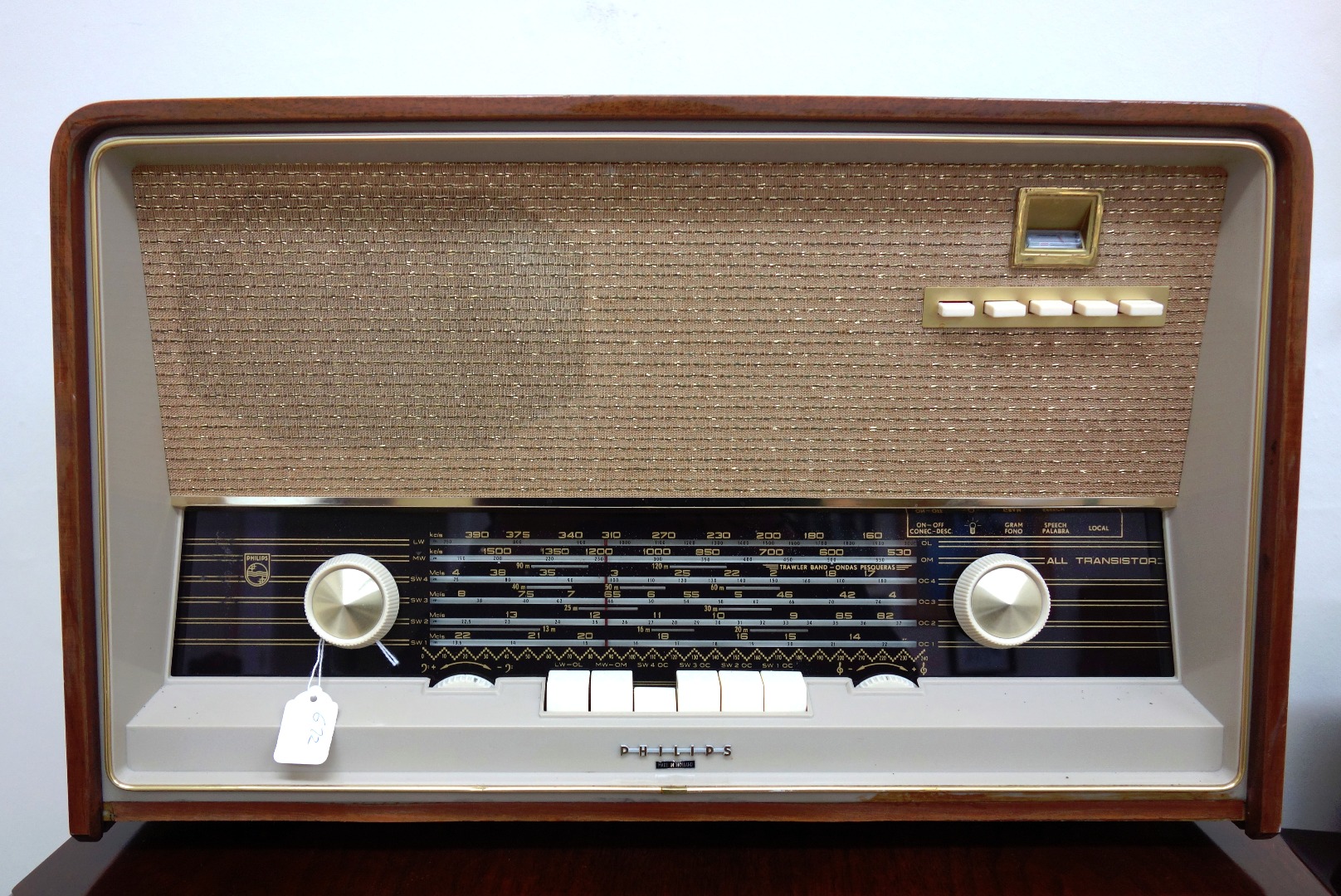 Appraisal: A Philips BGX T transistor multi-band radio in polished walnut