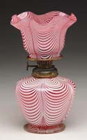 Appraisal: RARE NAILSEA MINI LAMP Unlisted Cranberry nailsea pattern on shade