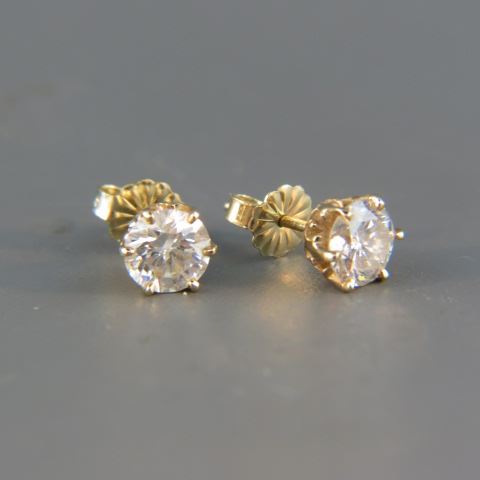 Appraisal: Diamond Stud Earrings carat total round diamonds k yellow gold