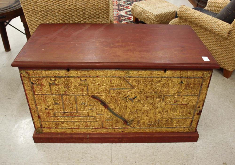 Appraisal: LARGE LIFT-TOP STORAGE CHEST Southeast Asia featuring relief-carved giltwood sides