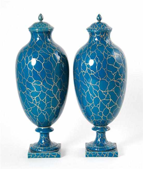 Appraisal: Pair Sevres porcelain covered urns vasiform on pedestal with domed