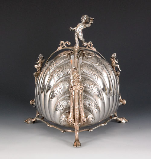 Appraisal: German silver biscuit box late th c with a putti