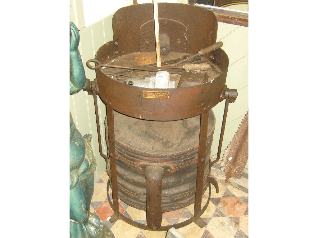 Appraisal: A farriers portable forge of cylindrical form with enclosed bellows