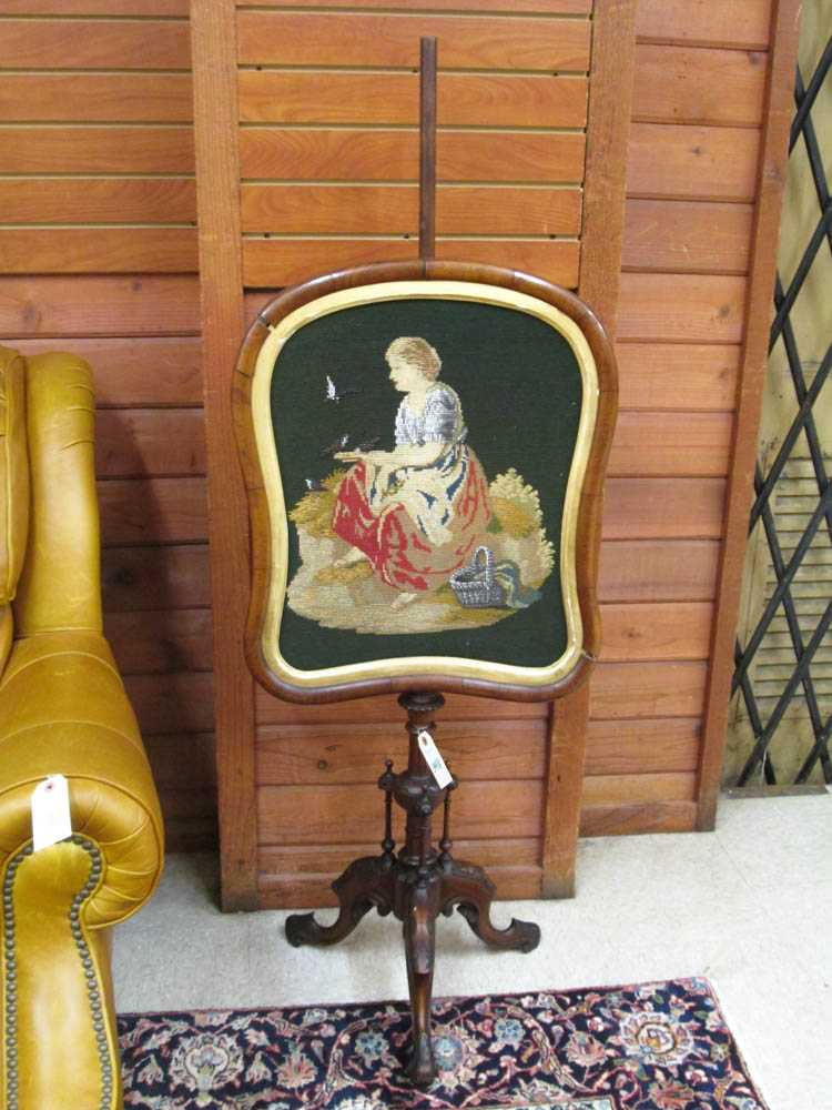 Appraisal: VICTORIAN WALNUT AND NEEDLEPOINT PORTRAIT POLE SCREEN English mid- th