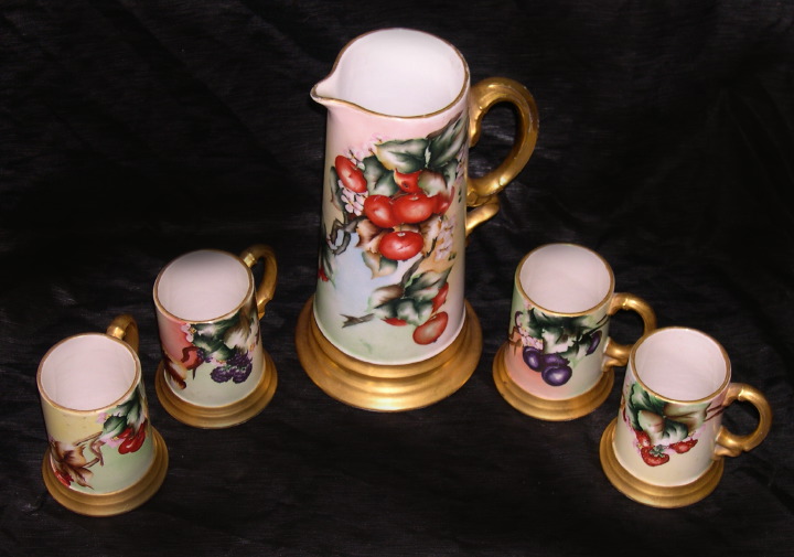 Appraisal: Five-Piece Continental Hand-Painted Porcelain Cider Beer Set for Four Persons