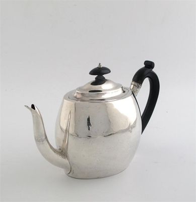 Appraisal: A George III tea pot of plain bulbous oval form