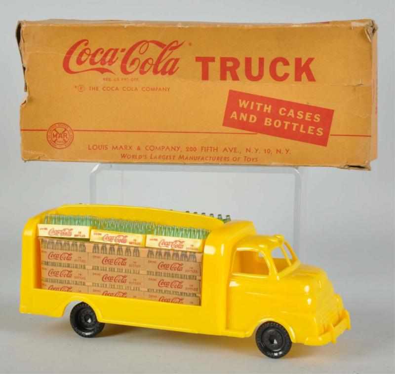 Appraisal: Coca-Cola Marx Toy Truck Description Features the cardboard insets in