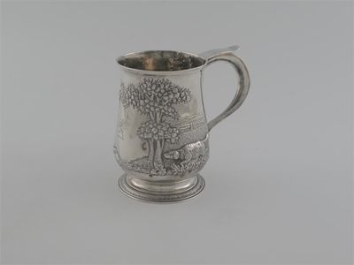 Appraisal: A George III baluster mug with later embossed countryside scene