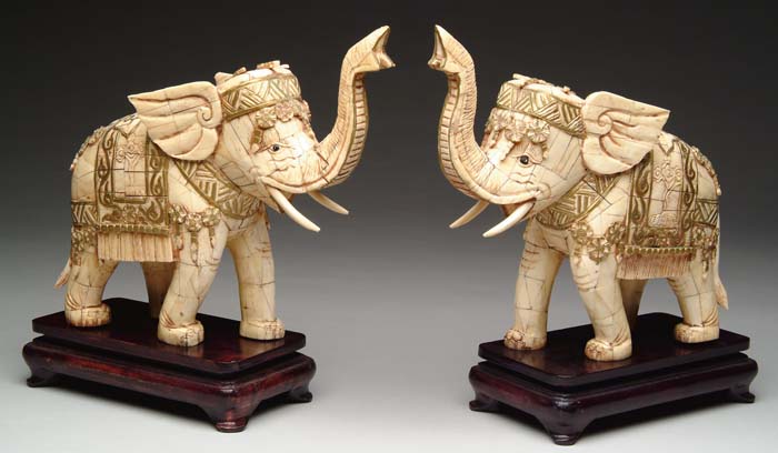 Appraisal: PAIR OF STANDING IVORY ELEPHANTS Pieced ivory elephants in standing