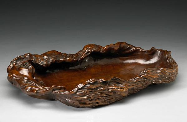 Appraisal: A carved hardwood tray Meiji Period Late th Century Employed