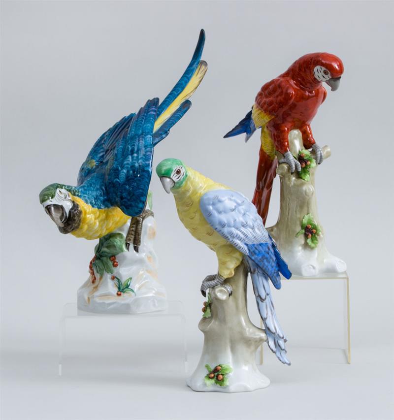 Appraisal: PAIR OF SITZENDORF PORCELAIN FIGURE OF PARROTS AND A GERMAN