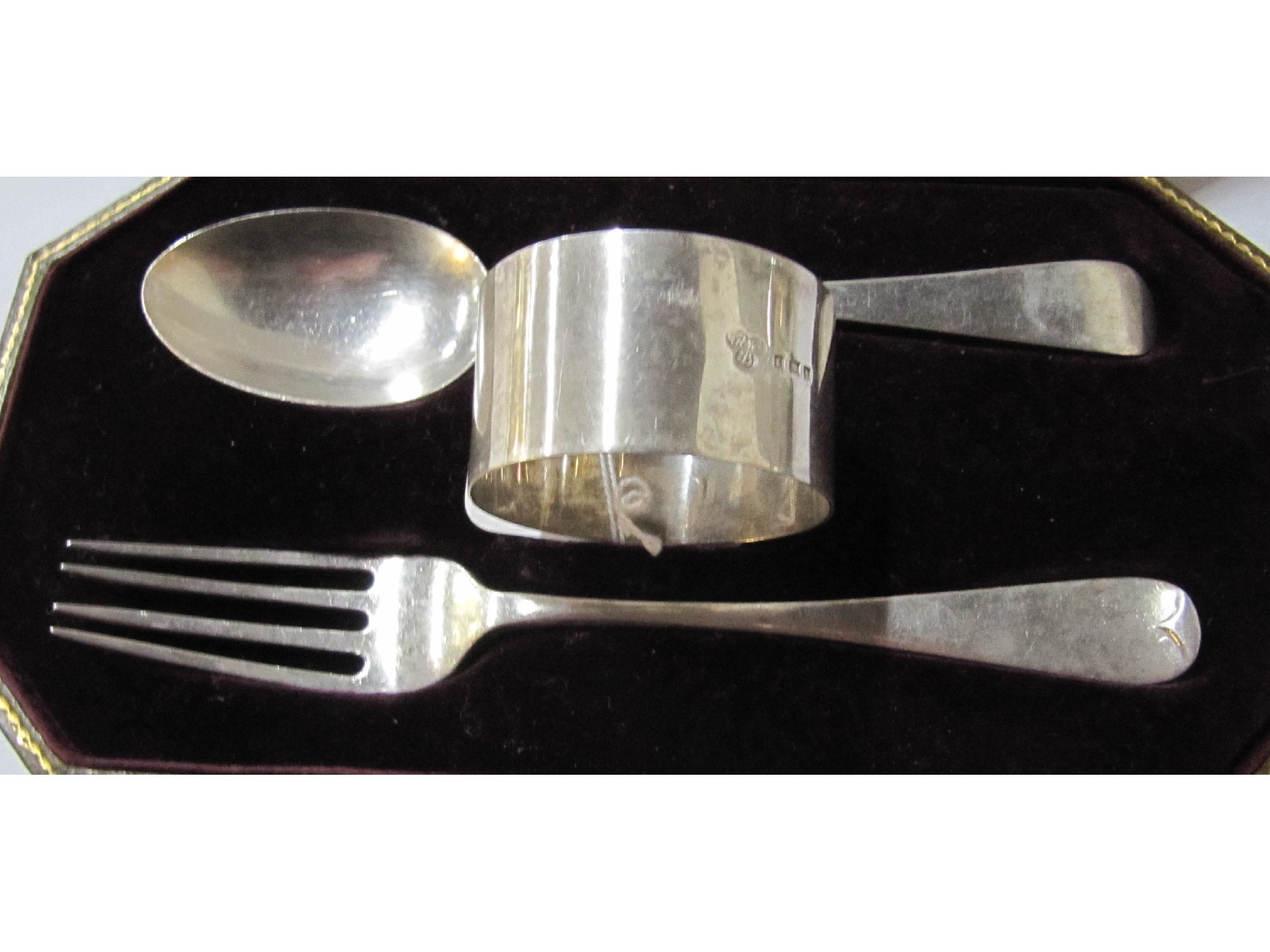 Appraisal: A cased three piece silver christening set London