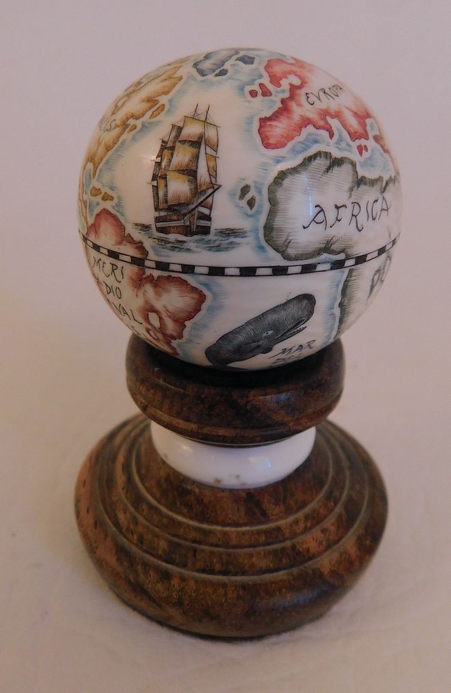 Appraisal: MINIATURE BONE GLOBE MAP Miniature scrimshaw bone globe of earth