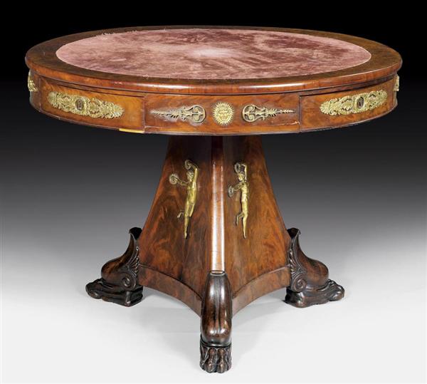 Appraisal: ROUND LIBRARY TABLE AUX PATTES DE LIONS Empire Northern Italy