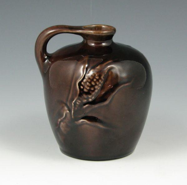 Appraisal: Weller Dickensware corn jug in gloss finish Marked Weller Dickens