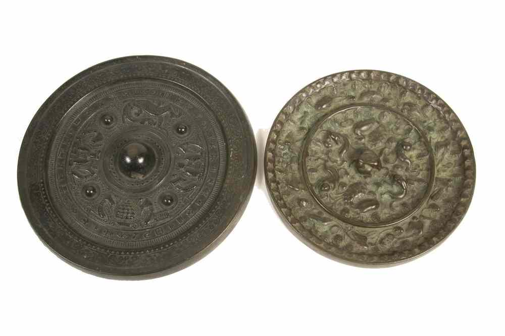 Appraisal: CHINESE BRONZE MIRRORS - Two Early Chinese Bronze Mirrors Sui