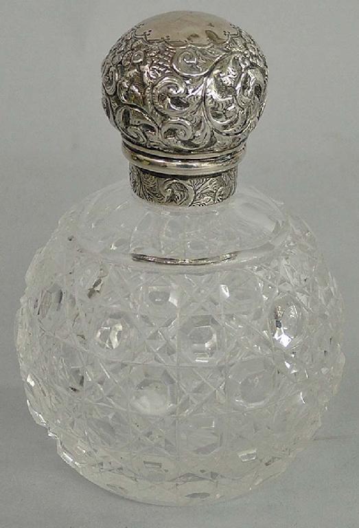 Appraisal: Victorian cut glass ovoid scent bottle with a foliate embossed