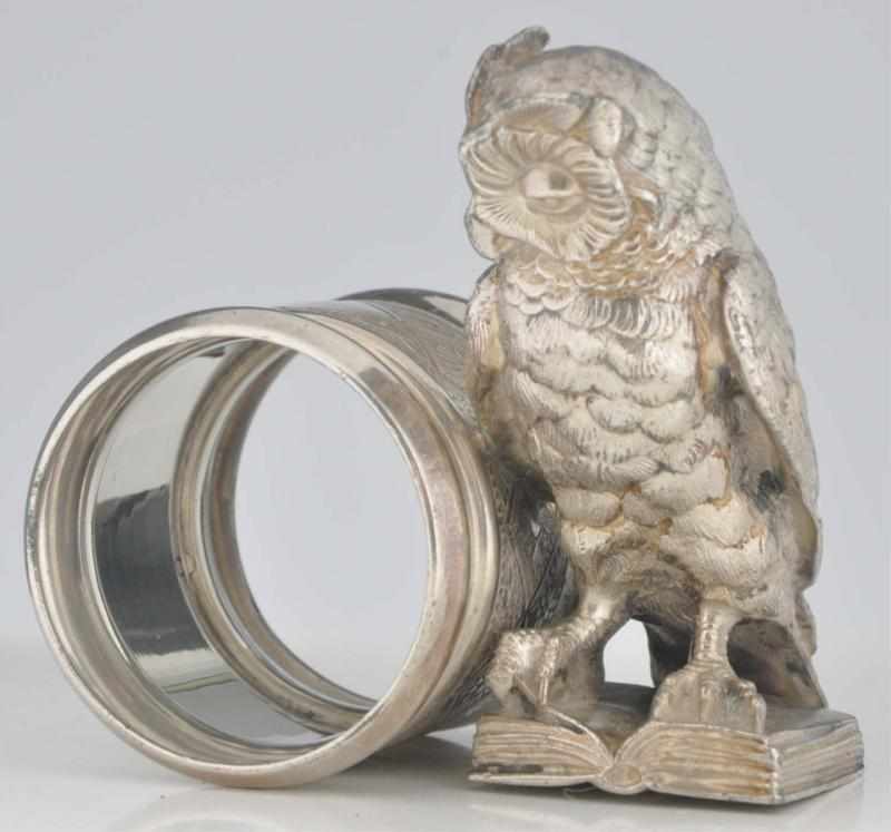 Appraisal: Owl Stands on Book Figural Napkin Ring By Rogers Smith