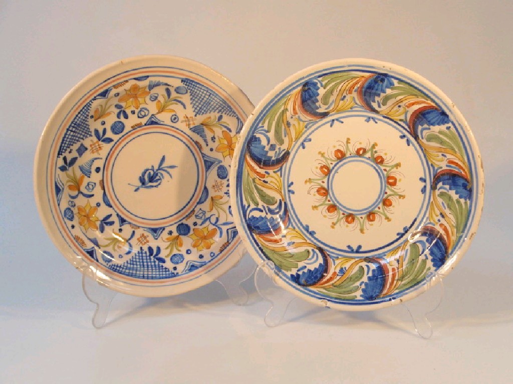 Appraisal: A continental maiolica dish hand painted with traditional foliate scrolls