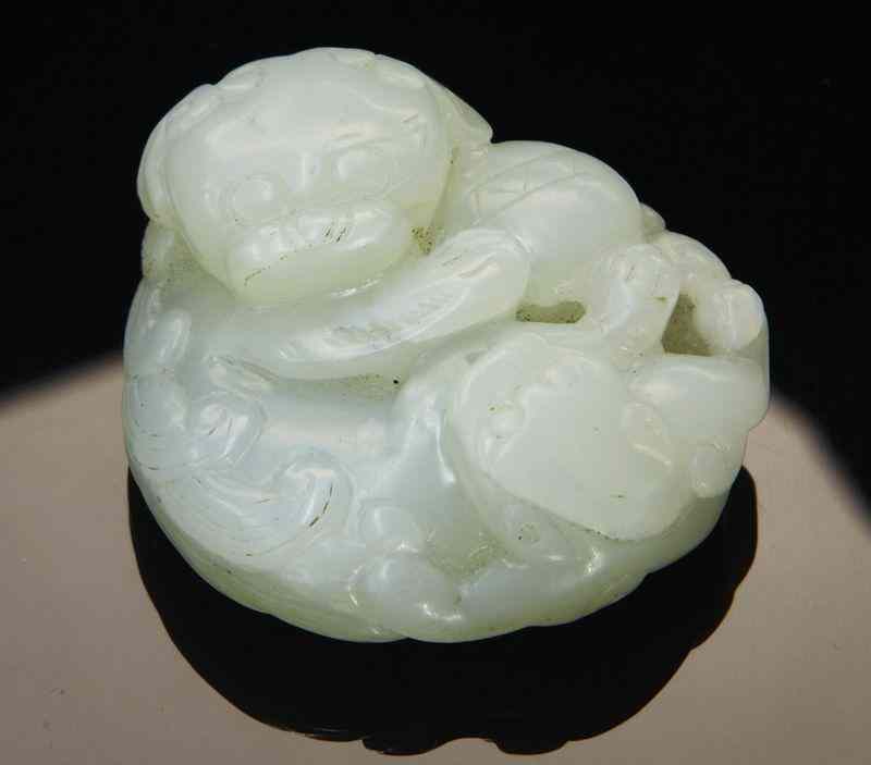 Appraisal: Chinese carved white jade double foo dog ''W Circa -