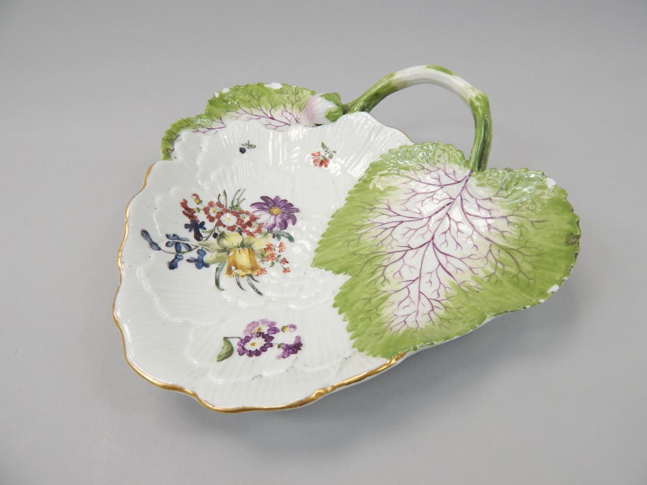 Appraisal: A thC Meissen leaf dish of shaped triangular outline gilt