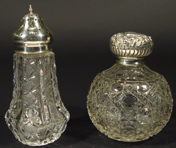 Appraisal: Globular silver topped cut glass scent bottle with embossed floral