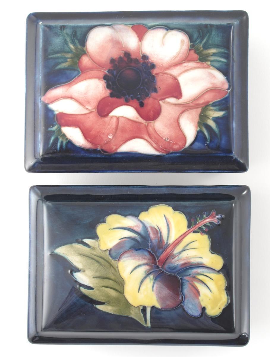 Appraisal: Anemone and Hibiscus two Moorcroft Pottery box and covers