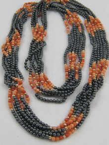 Appraisal: A six row coral and hematite bead necklace cm long