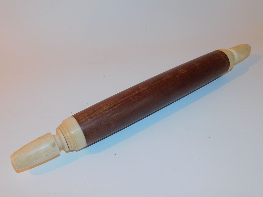 Appraisal: WHALE BONE WOOD ROLLING PIN th century sailor made lignum