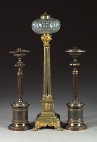 Appraisal: Weighty Pair of Continental Bronze-Patinated Brass Pedestal Candlesticks in the