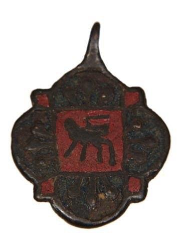 Appraisal: A MEDIEVAL BRONZE HERALDIC HARNESS PENDANT with enamelled coat of