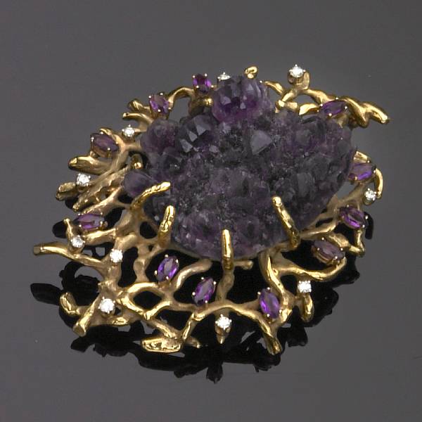 Appraisal: An amethyst diamond and gold pendant brooch featuring an amethyst